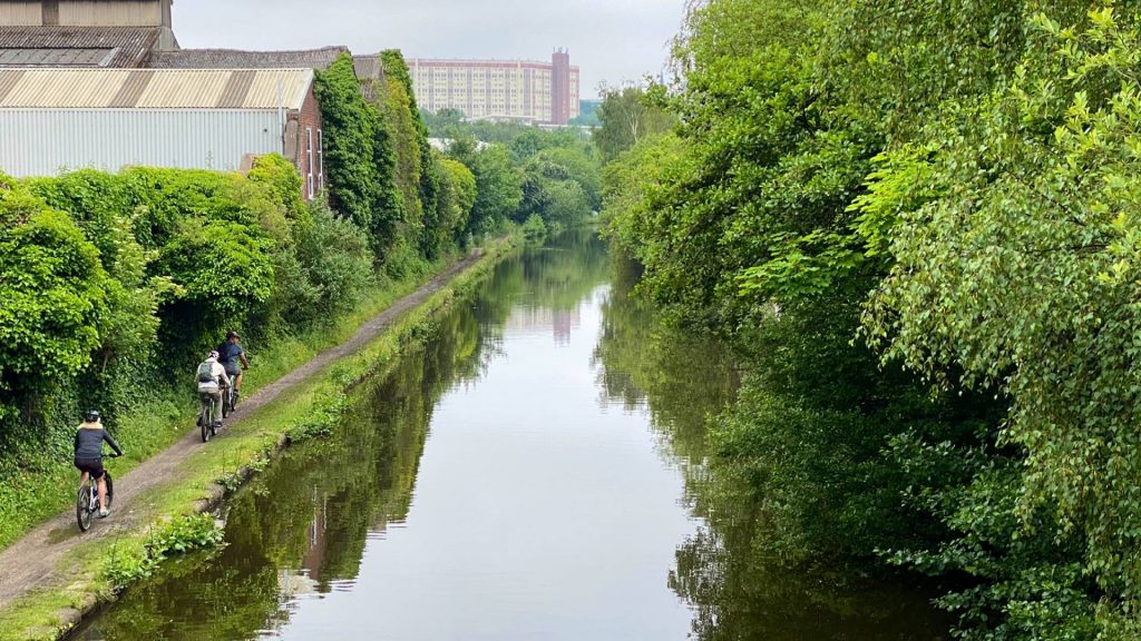 Picture of the Tinsley Canal with Park Hill in the background